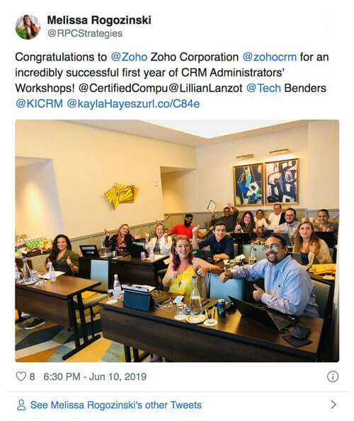 A congratulatory tweet by Melissa Rogozinski about Zoho CRM completing a year in training customers.