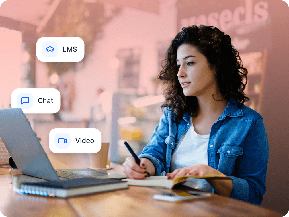 A person using their laptop and using features such as LMS, Chat and Video