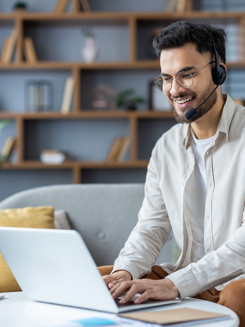 IT professional helping a customer remotely from a home office