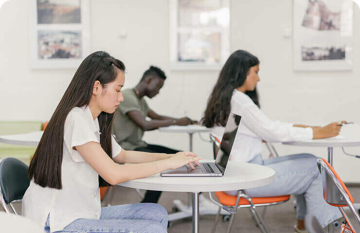Students using computers in a classroom