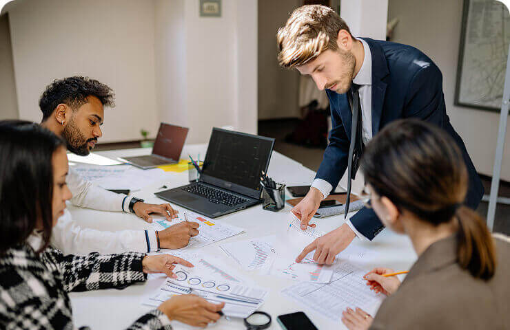 Finance professionals at trading workstations