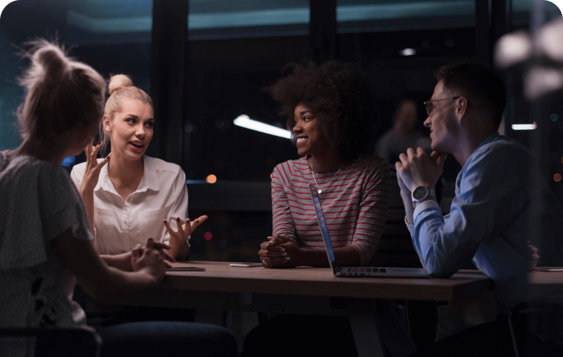 Employees collaborating together