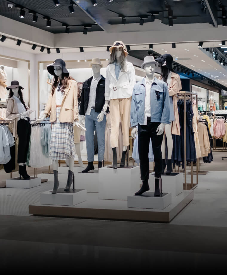 Fashion mannequins in a modern multi-outlet apparel store