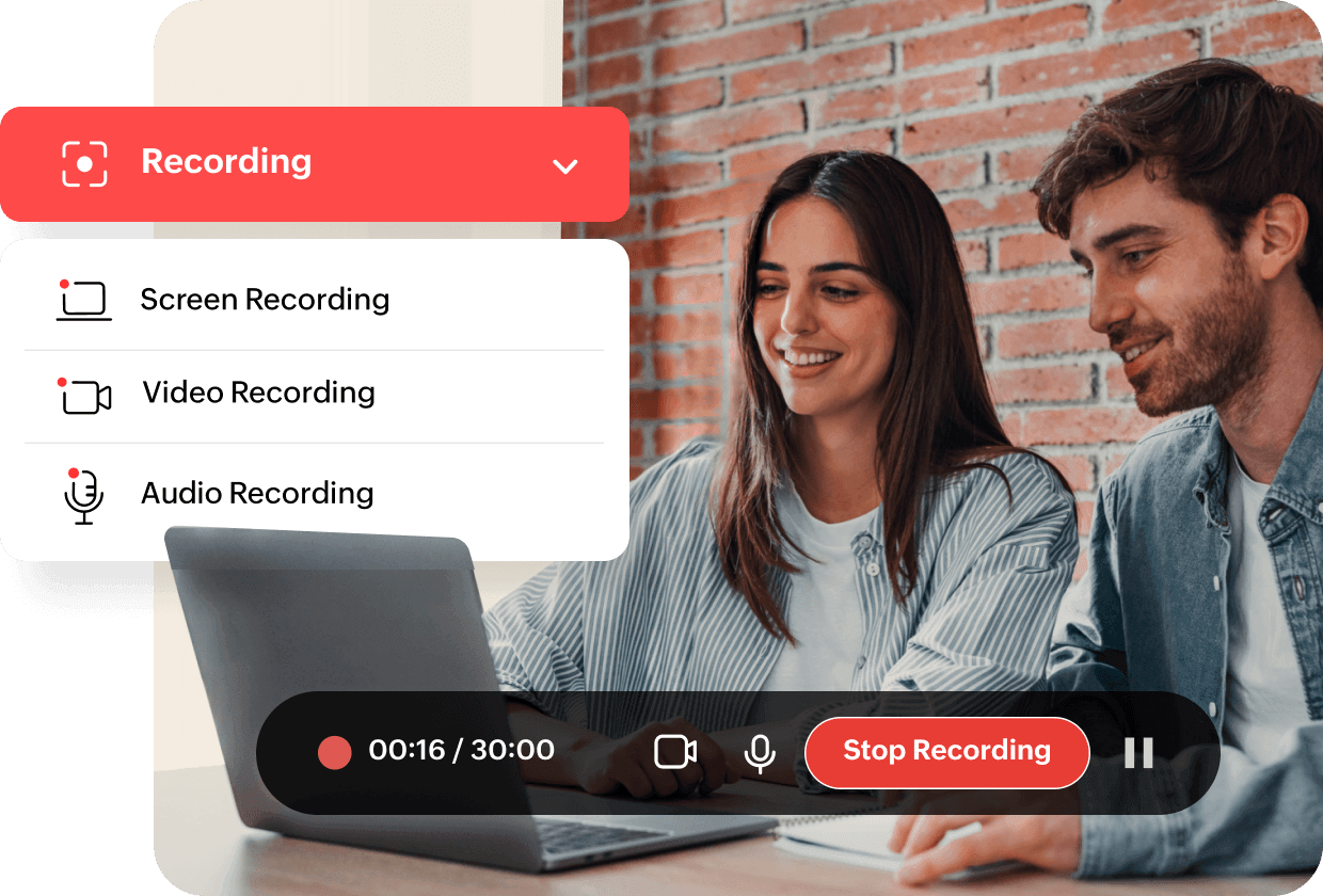 A pair of office workers checking out WorkDrive Snap on a laptop